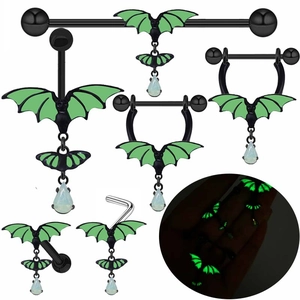 Luminous bat piercing set with black industrial barbells, nipple rings and navel studs
