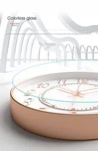 Detail of high-transparency colorless glass cover on a 12-inch modern rose gold wall clock