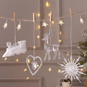 Transparent acrylic Christmas ornaments set with snowflake, reindeer and train shapes