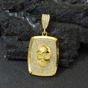 Collier hip-hop avec pendentif tête de mort doré et pierres de zircone scintillantes