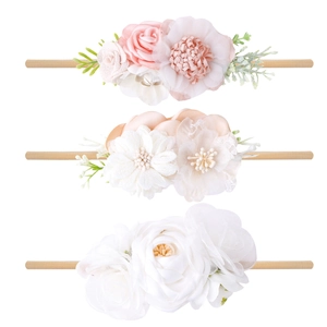 Three-piece set of floral baby headbands with soft nylon bands in pink and beige