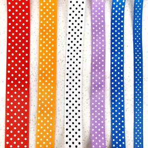 Multi-color polka dot grosgrain ribbons in red, purple, and blue for DIY gift bows