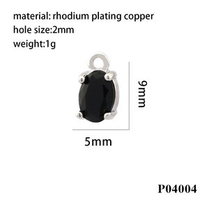Macro view of 9mm x 5mm oval black zircon pendant with rhodium plating copper details