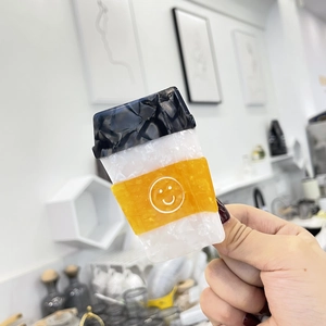 Cute acetate coffee cup hair claw clip with smiley face design for Christmas styling