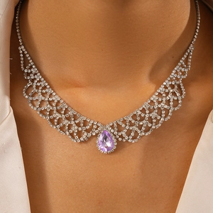 Close-up of luxury water drop necklace with purple crystal and mesh zircon pendant