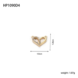 Macro detail of gold heart pendant with zircon inlay and HP1090D4 size specifications