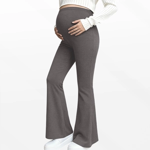 Detail showing high-waisted maternity flare leggings with supportive belly band in dark grey