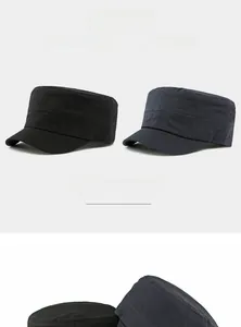 Detail view of cotton flat top army caps in black and navy with breathable side eyelets