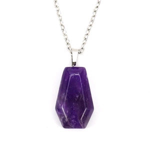 Close-up of a coffin-shaped purple amethyst stone pendant on a silver metal chain