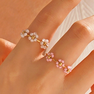 Fashionable stainless steel rings with pink and white beaded zircon flower designs