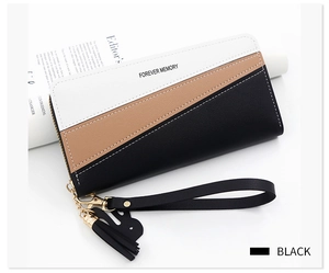 Chic tri-color patchwork leather wallet for women with tassel detail and wrist strap
