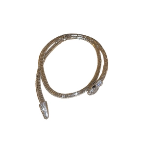 Silver flexible snake-shaped bracelet with sparkling rhinestones and black gem eyes