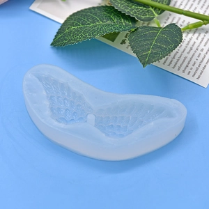 Semi-transparent white wing shaped silicone mold with feather texture for cake DIY