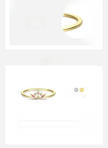 Detailed view of crown-shaped 925 silver ring with red zircon and 18K gold plating