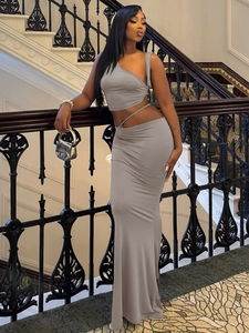 Women's chic grey two-piece set featuring one-shoulder crop top and slim maxi skirt