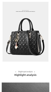 Macro detail of black wavy quilted leather texture and golden bow pendant on the handbag