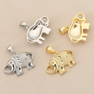 Macro view of gold and silver elephant pendants for DIY jewelry making accessories