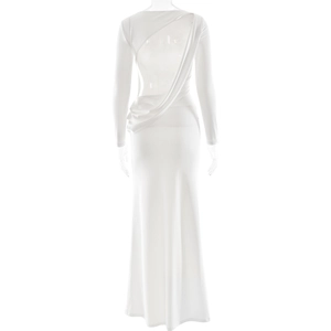 Detail view of white long sleeve floor length dress featuring an elegant backless design
