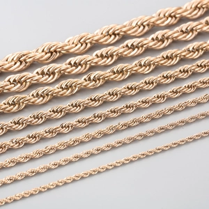 Various sizes of rose gold stainless steel twist rope chains in a group display