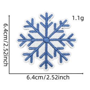 Macro view of blue and white snowflake embroidery patch with size details of 6.4cm