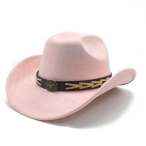 Detailed view of pink suede western hat with bull head emblem and woven leather band