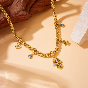 Gold-plated stainless steel necklace with Hamsa Hand and Evil Eye pendants on bead chain