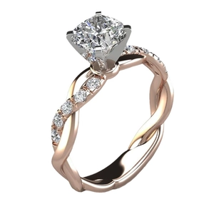 Rose gold and silver two-tone princess cut diamond ring with twisted band design