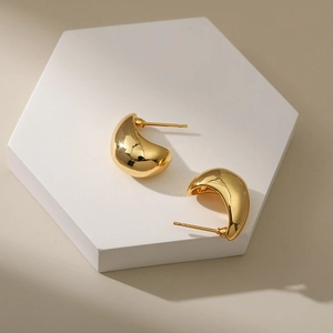 Minimalist 18K gold pea teardrop stud earrings with a high-polished metallic finish