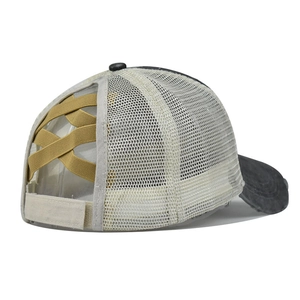 Detail view of high ponytail mesh baseball cap with criss-cross elastic bands and velcro strap