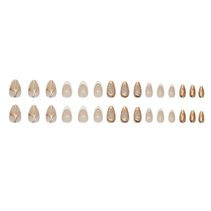 Short almond press-on nails with white French tips and gold sparkling textured patterns