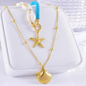 Double-layered gold titanium steel necklace with starfish, seashell, and turquoise charms