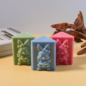 Detailed view of matte silicone molds featuring 3D rabbit and carrot relief carvings