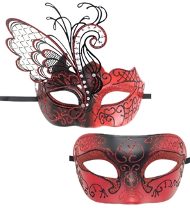 Detailed view of red and black butterfly masquerade masks with glitter and rhinestones