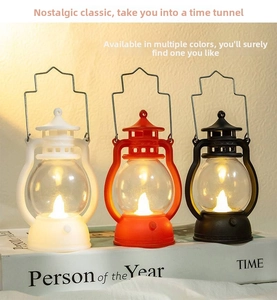 Close-up of LED vintage lanterns in white, red and black colors for holiday decoration