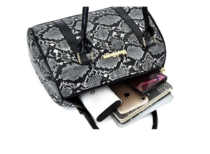 Top view of snake pattern boston bag showing spacious interior with daily essentials