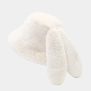 Detailed view of the soft white faux fur texture and long bunny ears on the bucket hat