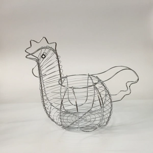 Detail of chicken-shaped metal wire basket for egg storage with a silver chrome finish