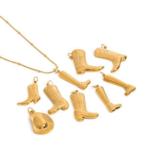 Golden cowboy style jewelry set with western hat and boots charms and necklace