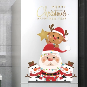 Christmas Santa Reindeer Snowman window wall stickers applied on a white refrigerator