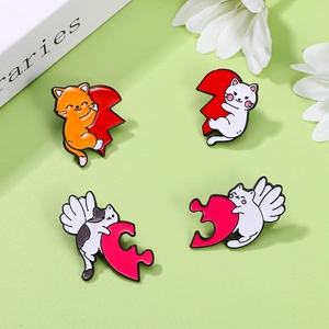 Detailed set of 4 cartoon cat enamel pins on green background with floral accents