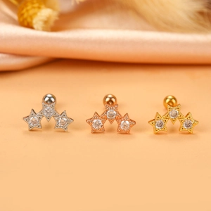 Three triple-star stud earrings in silver, gold, and rose gold with clear zircon stones