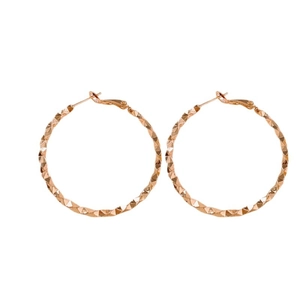 Irregular textured hoop earrings with rose gold finish and geometric surface pattern