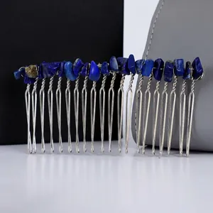 Detailed close-up of handmade hair comb with natural blue crystal stones and silver tines