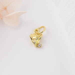 Golden sea creature pendant with yellow gemstone for DIY earrings and necklace crafting