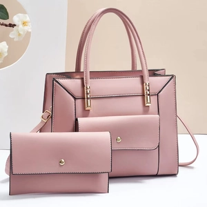 Chic 2-piece pink PU leather handbag set with large tote and matching envelope clutch