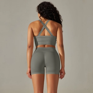 Back view of seamless ribbed sports set with criss-cross bra straps and high waist shorts