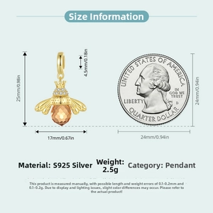 Size guide for S925 silver bee pendant with crystal beside a US quarter for scale
