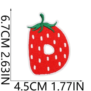 Detail view of strawberry letter D embroidered patch with dimensions 6.7cm by 4.5cm