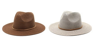 Detail of wide brim straw hats with leather bands in dark brown and light grey colors