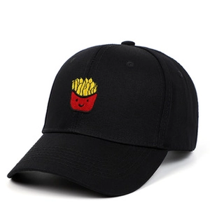 Detail of cartoon fries embroidery on black vintage washed cotton baseball cap